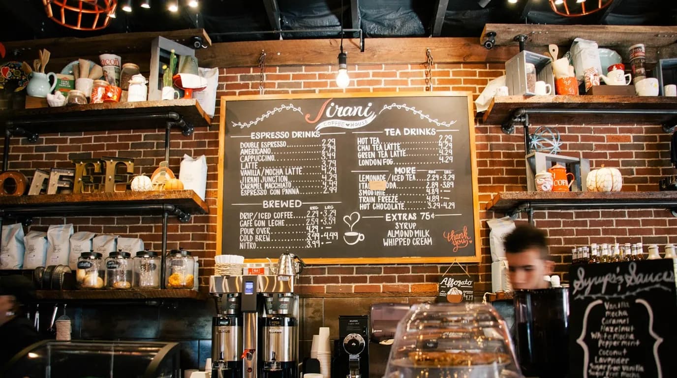 Cafes & Coffee Shops: staff at work in the business, where Reflys automates customer conversations