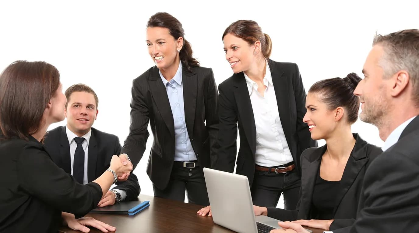 Commercial & Business Insurance Brokers: staff at work in the business, where Reflys automates customer conversations