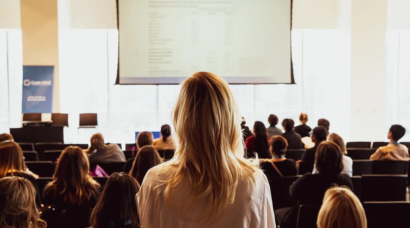 Corporate Event & Conference Planners: staff at work in the business, where Reflys automates customer conversations