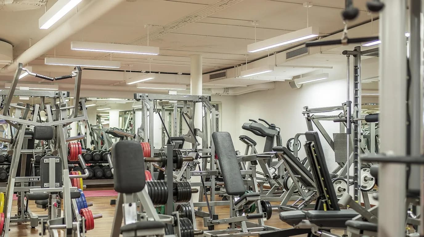 Gyms & Health Clubs: staff at work in the business, where Reflys automates customer conversations