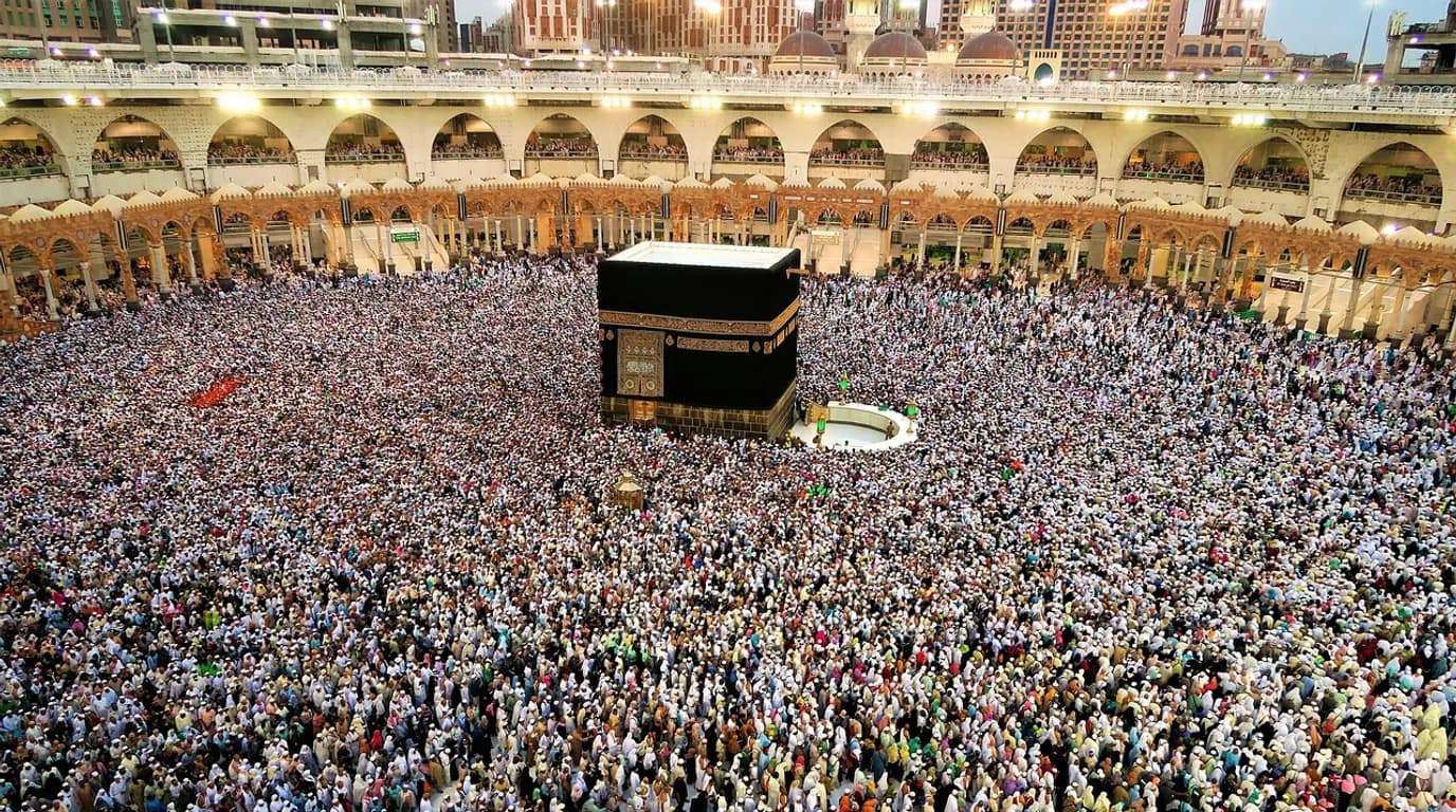 Hajj & Umrah Travel Agencies: staff at work in the business, where Reflys automates customer conversations