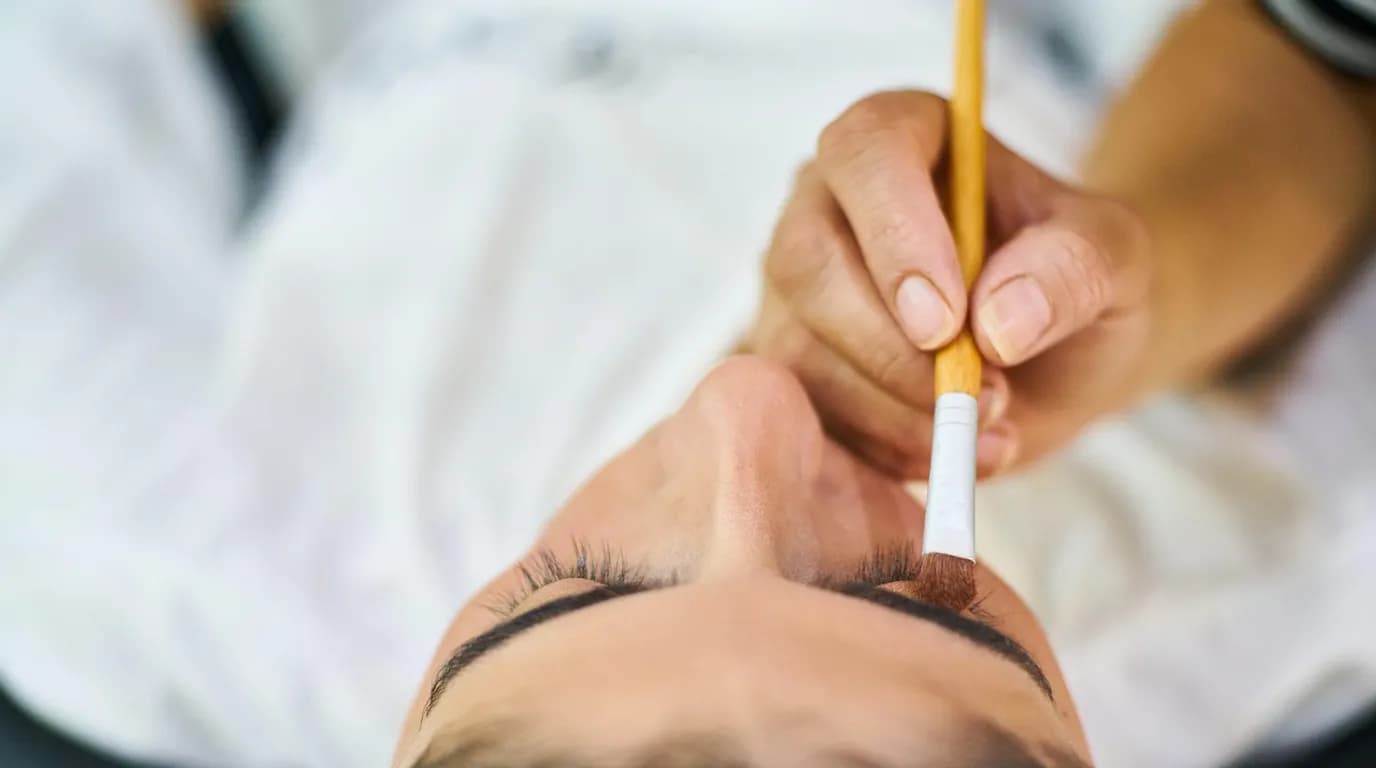 Lash & Brow Studios: staff at work in the business, where Reflys automates customer conversations