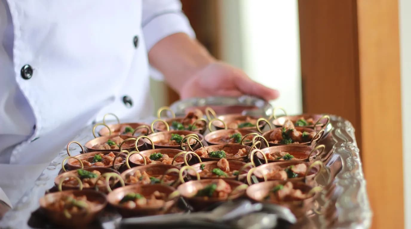 Restaurant Catering & Bulk Order Services: staff at work in the business, where Reflys automates customer conversations
